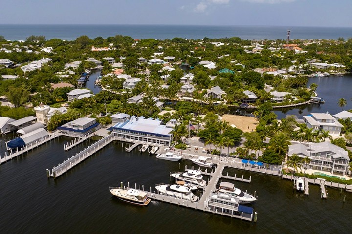 a boat is docked next to a body of water