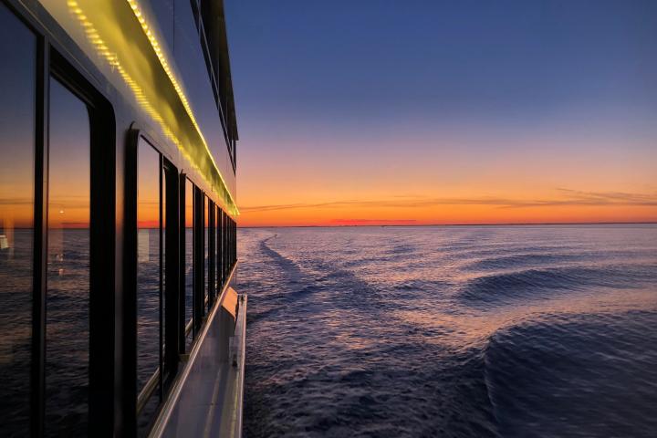 a sunset over a body of water