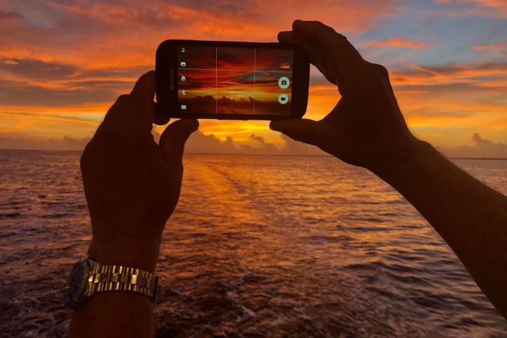 a sunset over a body of water