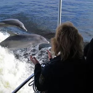 a person standing in front of a body of water